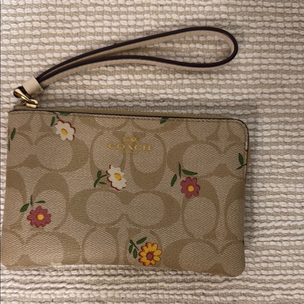 Coach Tan Wristlet with Floral Accents